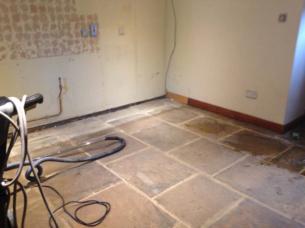 Yorkstone floor before cleaning and sealing in Deepcar Sheffield