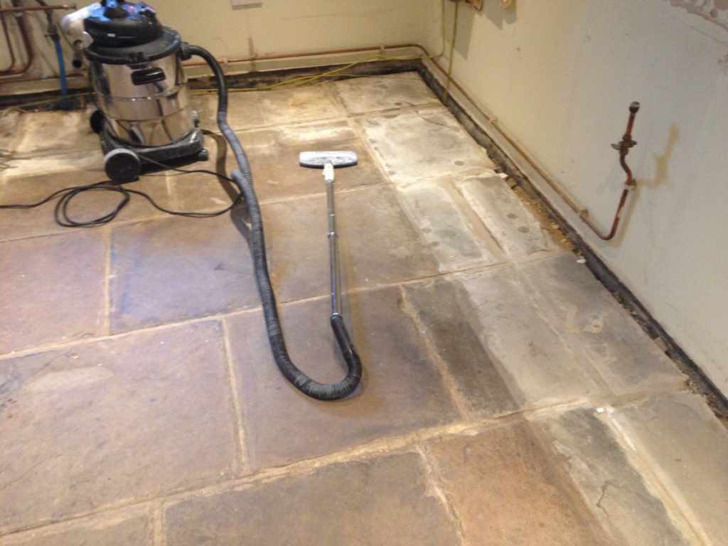 Yorkstone floor before cleaning and sealing in Deepcar Sheffield
